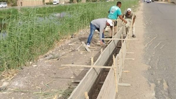بعد مصرع 7 أفراد، تأمين طريق ترعة المريوطية وإنشاء سور للحماية (صور)
