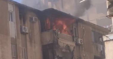 السيطرة على حريق بسيارة نقل أعلى محور الأوتوستراد