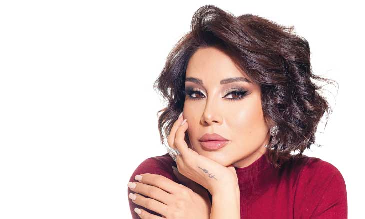 كاريس بشار تفتح الصناديق في برنامج «السلم والثعبان» فكيف أجابت على الأسئلة؟