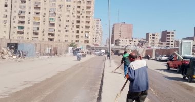 محافظة الجيزة تطلق حملة نظافة بشارع كعبيش فيصل لرفع كفاءة الطريق