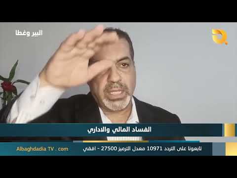 The well and its cover with Dr. Jassim Al-Shammari