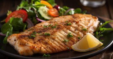 منيو فطار 12 رمضان.. طريقة عمل سمك مشوى بالفرن وأرز بالخلطة