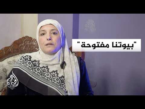A Palestinian woman from the Ain al-Hilweh refugee camp is hosting displaced people from Tyre in ...