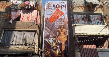 أهالى إمبابة عيلة واحدة.. الشباب يجهزون مائدة بطول 43 شارعًا.. شارع الاعتماد يتحول إلى متحف مفتوح.. تماثيل فرعونية ومجسم للكعبة وفانوس بطول 10 أمتار.. والألعاب النارية والأجواء الكرنفالية تخطف الأنظار