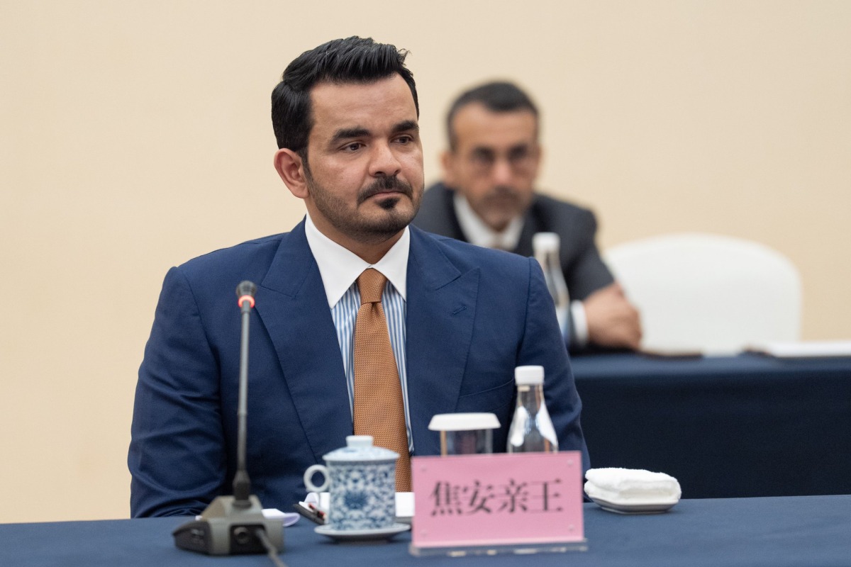 ‫ رئيس المجلس الأولمبي الآسيوي يجتمع مع عضو مجلس الدولة بالصين