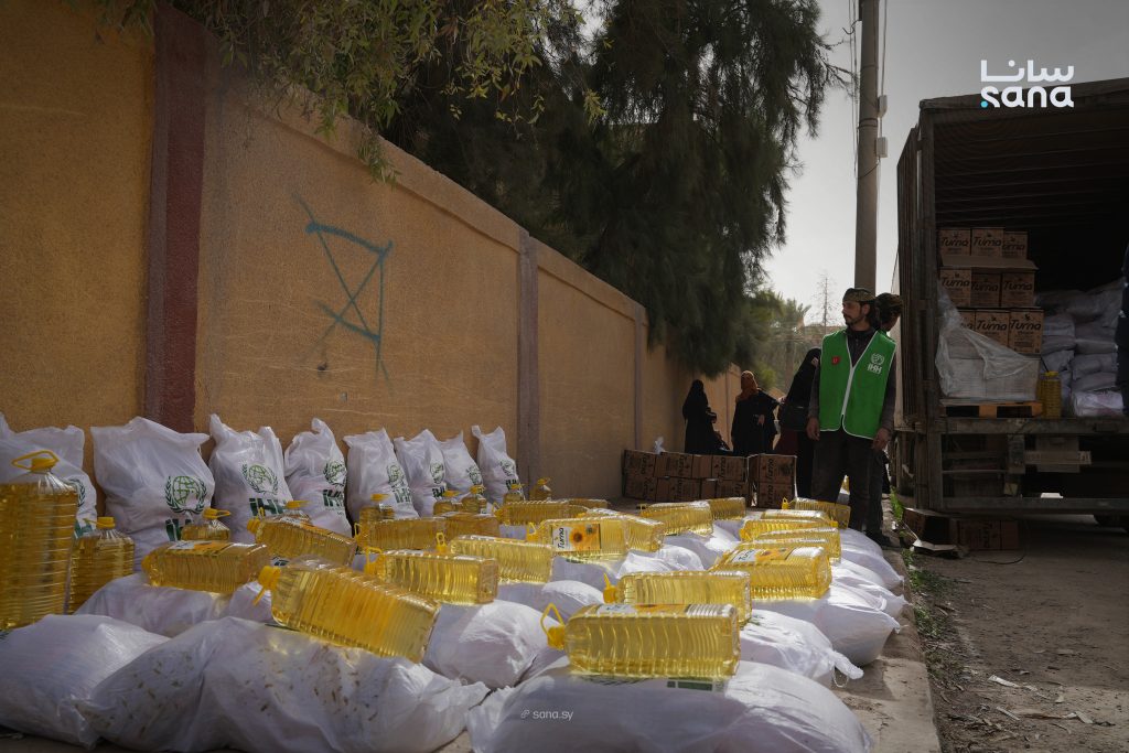 توزيع 1600 سلة غذائية في الميادين والبوكمال بدير الزور