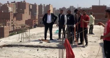 إزالة أدوار مخالفة خلال حملة بمنطقة أرض اللواء فى حى العجوزة