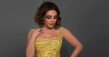 4 إطلالات مميزة للنجمة أنغام باللون الأصفر الكهرمانى